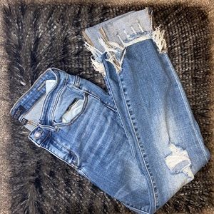 Dark washed distressed capris